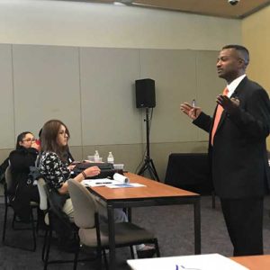 Fgovernment contractor whistleblower defense attorney meeting with client